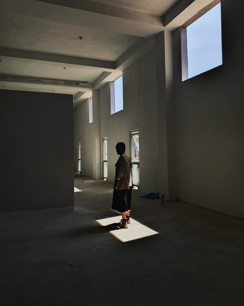 a person standing on a white platform