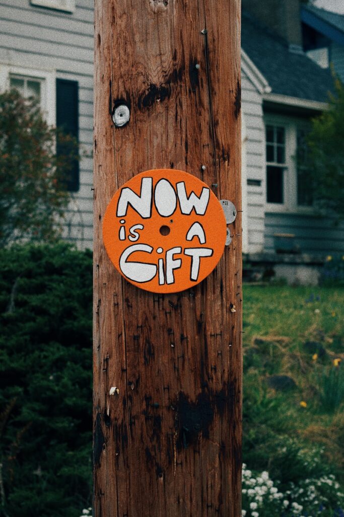 brown wooden post with red and white number 8 print